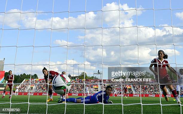 Mexico's goalkeeper Cecilia Santiago eyes the ball after a goal of England's forward Fran Kirby during a Group F match at the 2015 FIFA Women's World...