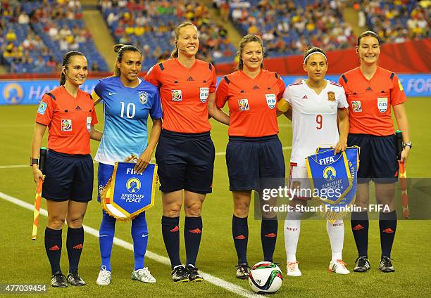 Marta of Brazil makes the handshake for peace with Veronica Boquete of Spain during the FIFA Women's World Cup 2015 group E match between Brazil and...