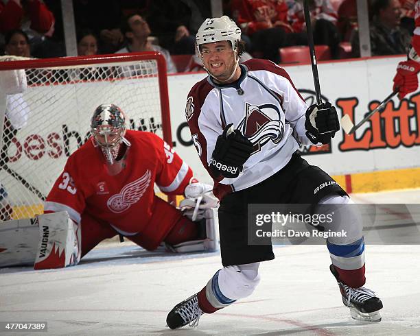 Parenteau of the Colorado Avalanche pumps his fists after scoring on goalie Jimmy Howard of the Detroit Red Wings during an NHL game on March 6, 2014...