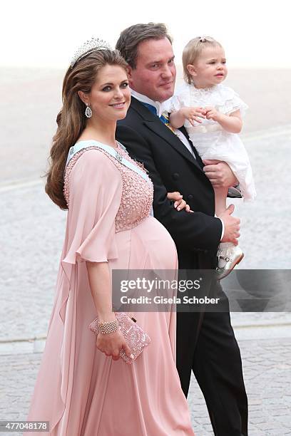 Princess Madeleine of Sweden, her husband Christopher O'Neill and their daughter Princess Leonore attend the royal wedding of Prince Carl Philip of...