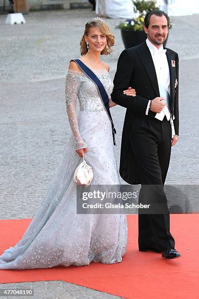 Prince Nikolaos of Greece and Princess Tatiana of Greece attend the royal wedding of Prince Carl Philip of Sweden and Sofia Hellqvist at The Royal...