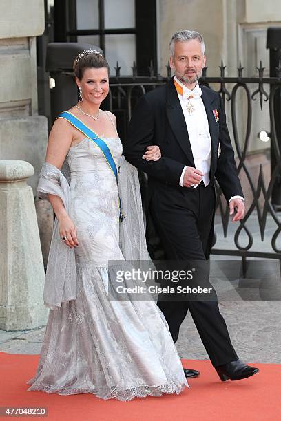 Princess Maertha Louise of Norway and husband Ari Behn attend the royal wedding of Prince Carl Philip of Sweden and Sofia Hellqvist at The Royal...