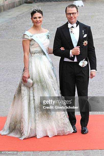 Crown Princess Victoria of Sweden and her husband Prince Daniel of Sweden, Duke of Vastergotland, attend the royal wedding of Prince Carl Philip of...