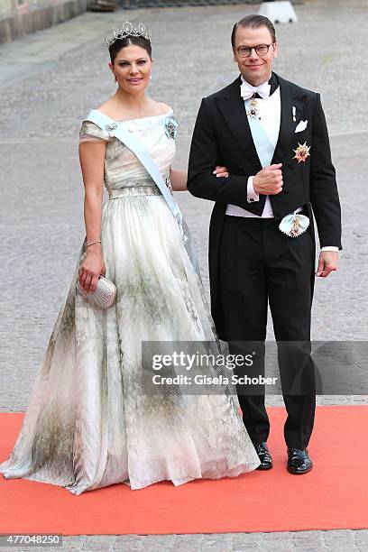 Crown Princess Victoria of Sweden and her husband Prince Daniel of Sweden, Duke of Vastergotland, attend the royal wedding of Prince Carl Philip of...