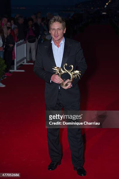 Benoit Magimel awarded best actor during the closing ceremony of the 29th Cabourg Film Festival on June 13, 2015 in Cabourg, France.