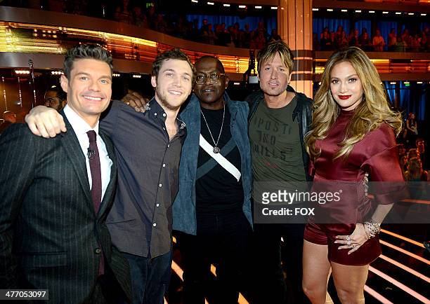 Host Ryan Seacrest, singer Phillip Phillips, mentor Randy Jackson, and judges Jennifer Lopez and Keith Urban at FOX's "American Idol XIII" Top 12 to...