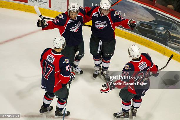 Josh Ho-Sang of the Windsor Spitfires celebrates a goal against the Saginaw Spirit on March 6, 2014 at the WFCU Centre in Windsor, Ontario, Canada.