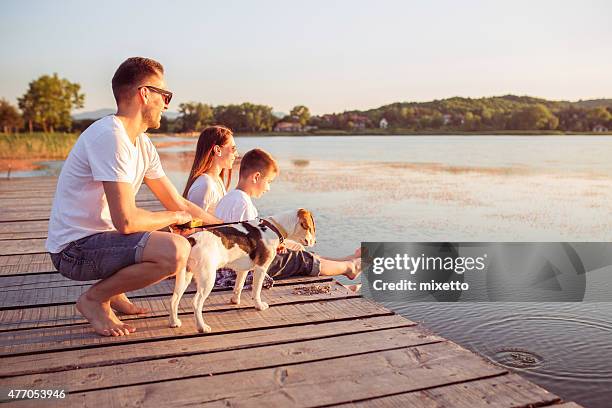 family enjoyment - young family outdoors stockfoto's en -beelden