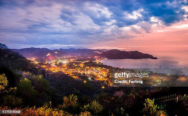 beaches of coco, guanacaste, costa rica at dusk - costa rica stock pictures, royalty-free photos & images