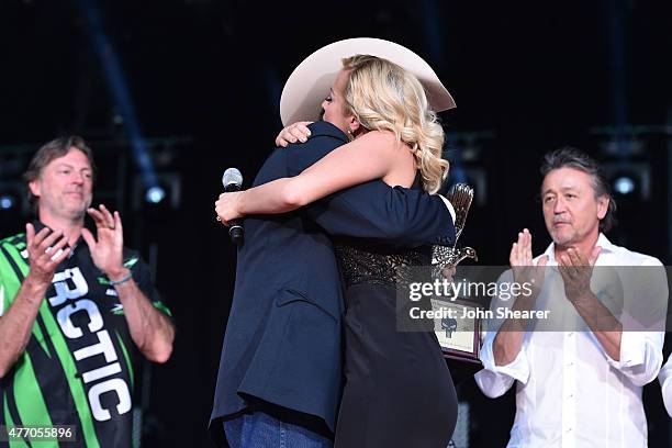 Wayne Kyle father of United States Navy SEAL sniper Chris Kyle, onstage with singer Kellie Pickler during the 2015 CMA Festival on June 13, 2015 in...