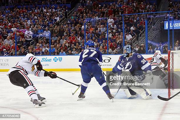 Antoine Vermette of the Chicago Blackhawks scores a goal in the third period past Ben Bishop of the Tampa Bay Lightning during Game Five of the 2015...