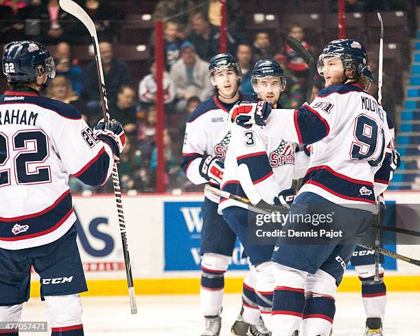 Nick Moutrey of the Saginaw Spirit celebrates a goal against the Windsor Spitfires on March 6, 2014 at the WFCU Centre in Windsor, Ontario, Canada.