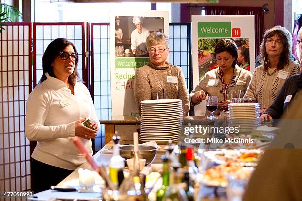 Bria Day speaks to the guests, champs and chefs before the start of the Milwaukee Recipe Refresh Challenge at Il Mito Restaurant on March 06, 2014 in...