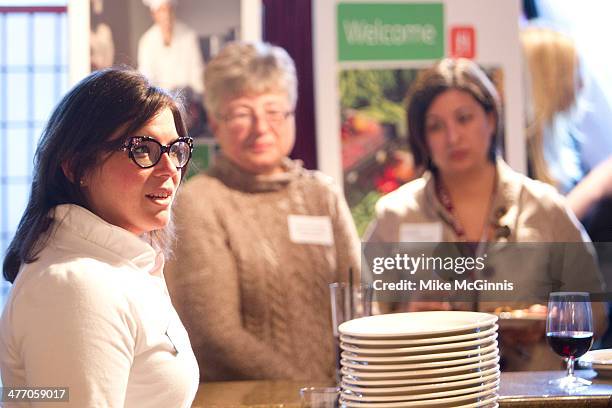 Bria Day speaks to the guests, champs and chefs before the start of the Milwaukee Recipe Refresh Challenge at Il Mito Restaurant on March 06, 2014 in...