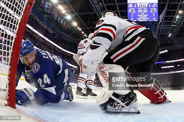 Ryan Callahan of the Tampa Bay Lightning collides with Corey Crawford of the Chicago Blackhawks during the third period in Game Five of the 2015 NHL...