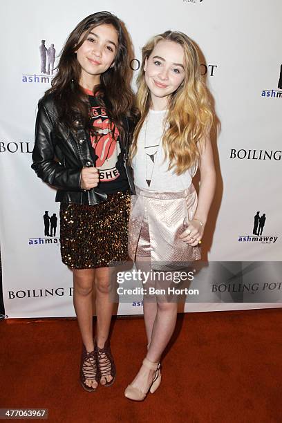 Actress Rowan Blanchard and Sabrina Carpenter attend the private screening for "Boiling Pot" on March 6, 2014 in Los Angeles, California.