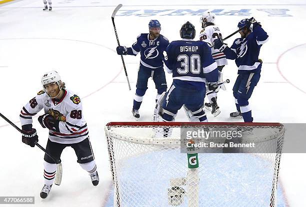 Patrick Kane of the Chicago Blackhawks reacts as Ben Bishop of the Tampa Bay Lightning talks with Steven Stamkos during Game Five of the 2015 NHL...