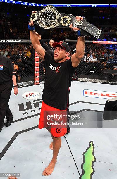 Fabricio Werdum of Brazil celebrates his submission victory over Cain Velasquez of the United States in their UFC heavyweight championship bout...