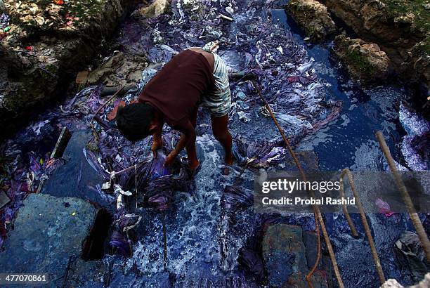 Every day 9 year old Jashim collects pieces of cloth from the liquid waste of the dyeing industries. He sells his findings to traders, thereby...