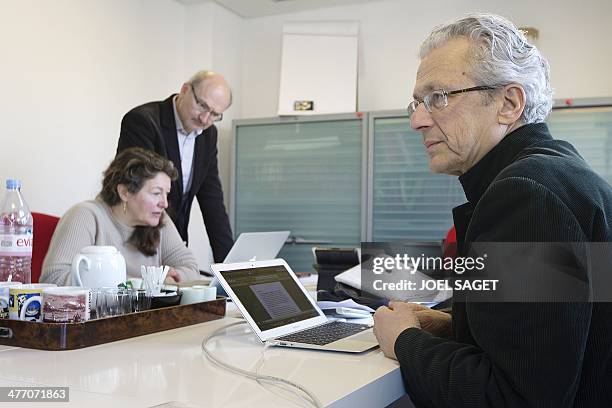 French journalists Eric Fottorino and Laurent Greilsamer pose in their office on March 6, 2014 in Paris. . The former director of the French...