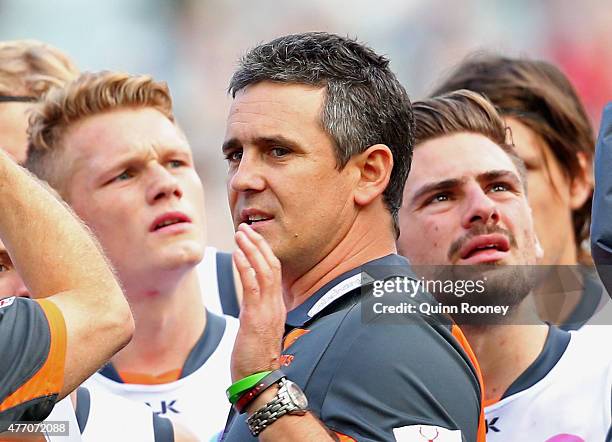 Leon Cameron the coach of the Giants talks to his players during the round 11 AFL match between the Collingwood Magpies and the Greater Western...