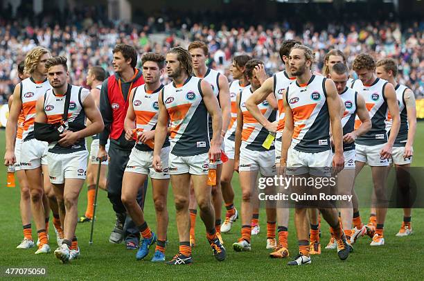 The Giants look dejected after losing the round 11 AFL match between the Collingwood Magpies and the Greater Western Sydney Giants at Melbourne...