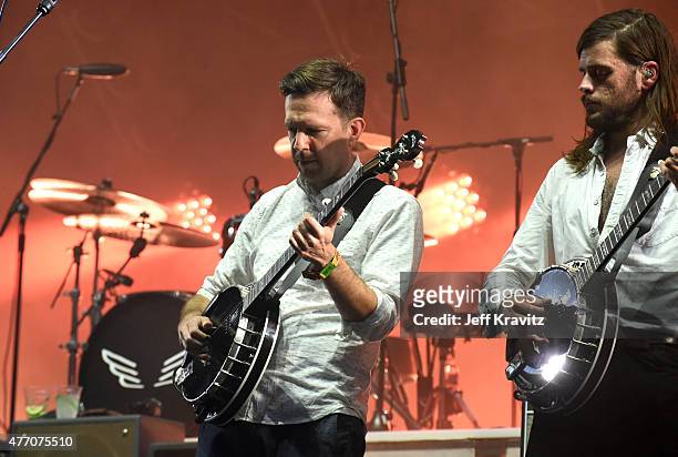 Actor Ed Helms and Winston Marshall of Mumford & Sons perform onstage at What Stage during Day 3 of the 2015 Bonnaroo Music And Arts Festival on June...