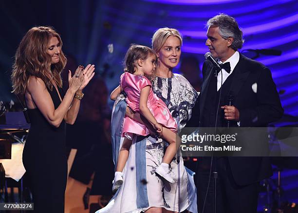 Singer Celine Dion, Andrea Bocelli's daughter Virginia Bocelli, actress Sharon Stone and honoree Andrea Bocelli speak onstage during the 19th annual...
