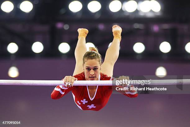 Giulia Steingruber of Switzerland competes on the uneven bars in the Women's Team Final and Individual Qualification during day two of the Baku 2015...