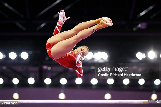 Giulia Steingruber of Switzerland competes on the uneven bars in the Women's Team Final and Individual Qualification during day two of the Baku 2015...