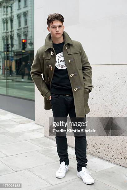 Model and performer Max Jorquera wears Topman jeans, Ericouture T shirt, Converse trainers and Thomas Farthing jacket on day 2 of London Collections:...