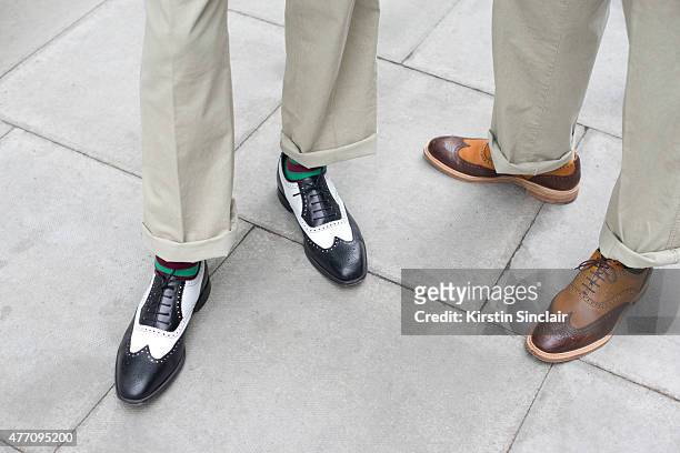 Islington Twins Chuka and Dubem Okonkwo wear all Thomas Farthing on day 2 of London Collections: Men on June 13, 2015 in London, England.