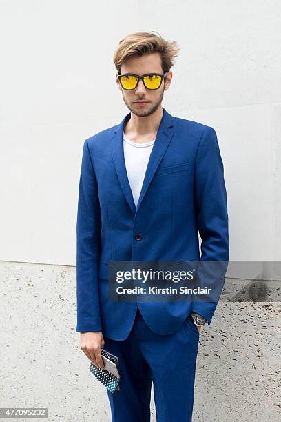 Fashion blogger and model Ruben Ramos wears Hawkers sunglasses, Zara suit and Ralph Lauren T shirt on day 2 of London Collections: Men on June 13,...