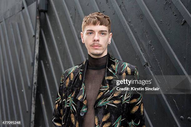 Fashion and accessories designer Simon Peters wears a Chin Wang suit, Issey Miyake top on day 2 of London Collections: Men on June 13, 2015 in...