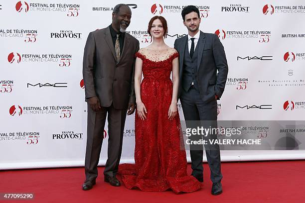 French actor Jean-Michel Martial, French actress Odile Vuillemin and French actor Raphael Ferret pose during the opening ceremony of the 55th...