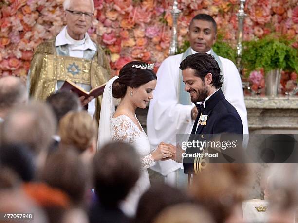 Prince Carl Philip of Sweden is seen with his new wife Princess Sofia of Sweden at their marriage ceremony at The Royal Palace on June 13, 2015 in...