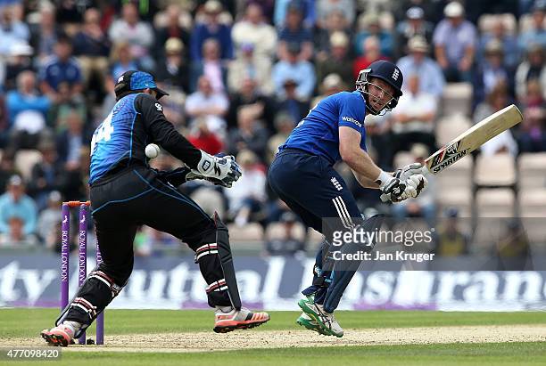 Luke Ronchi of New Zealand fails to gather with Eoin Morgan of England out of his crease during the 3rd ODI Royal London One-Day Series 2015 between...