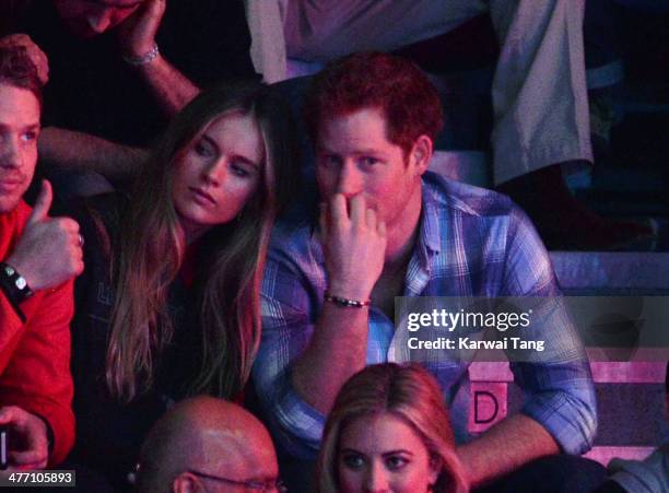 Cressida Bonas and Prince Harry attend We Day UK, a charity event to bring young people together at Wembley Arena on March 7, 2014 in London, England.