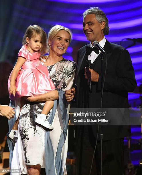 Andrea Bocelli's daughter Virginia Bocelli is held by actress Sharon Stone after honoree Andrea Bocelli performed during the 19th annual Keep Memory...