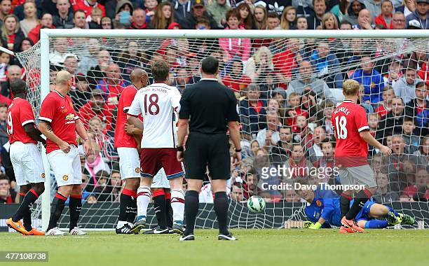 Michael Tarnat of Bayern Munich All Stars, , scores his sides second goal during the Manchester United Foundation charity match between Manchester...