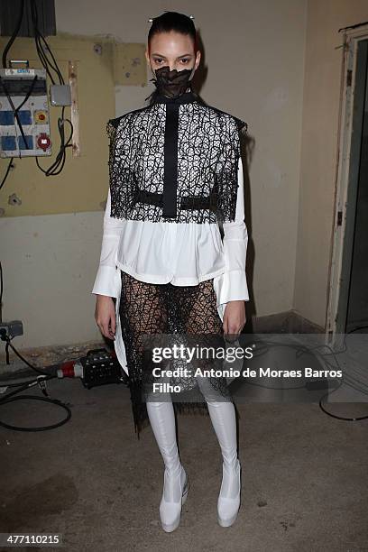 Model poses prior the Masha Ma show as part of the Paris Fashion Week Womenswear Fall/Winter 2014-2015 on March 5, 2014 in Paris, France.