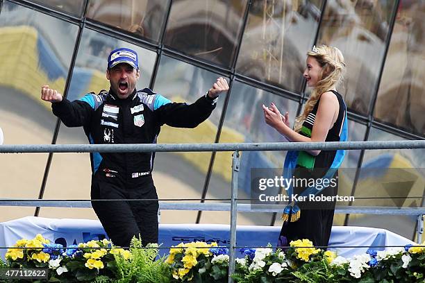 The Dempsey Proton Racing Porsche driver and actor Patrick Dempsey celebrates on the podium after finishing second in the LM GTE Am class with team...