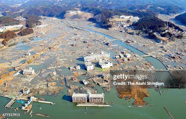 In this aerial image, tsunami devastated Minamisanriku town two days after the Magnitude 9.0 strong earthquake and subsequent tsunami on March 13,...