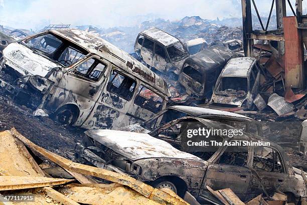 Burnt cars by the fire occered after a 9.0 magnitude strong earthquake and subsequent tsunami struck on March 12, 2011 in Kesennuma, Miyagi, Japan....