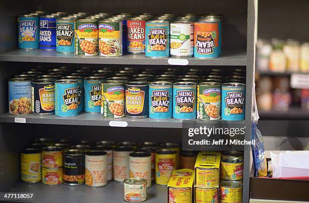 Food is stored as Stuart Little volunteers pack food at a food bank on March 7, 2014 in Whitburn, Scotland. Charities based in Scotland are reporting...