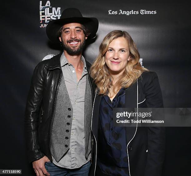 Ryan Bingham and Director/Co-Writer Anna Axster attends the World Premiere of "A Country Called Home" at The 2015 Los Angeles Film Festival at Regal...