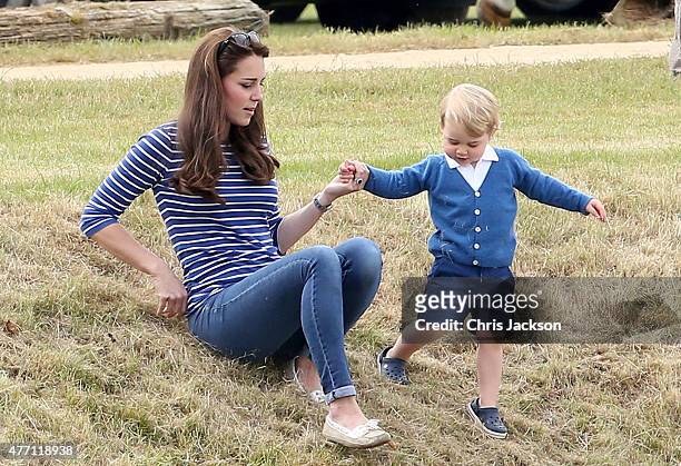 Catherine Duchess of Cambridge and Prince George attend the Gigaset Charity Polo Match with Prince George of Cambridge at Beaufort Polo Club on June...