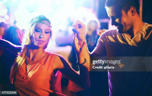 two people dancing at concert. - latin american dancing stock pictures, royalty-free photos & images