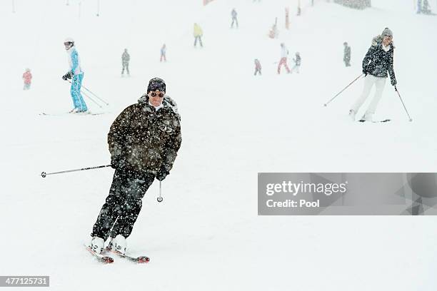 King Philippe and Queen Mathilde of Belgium ski during their winter holiday on March 3, 2014 in Verbier, Switzerland.