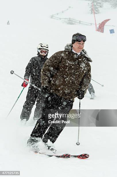 King Philippe of Belgium and Prince Gabriel ski during their winter holiday on March 3, 2014 in Verbier, Switzerland.